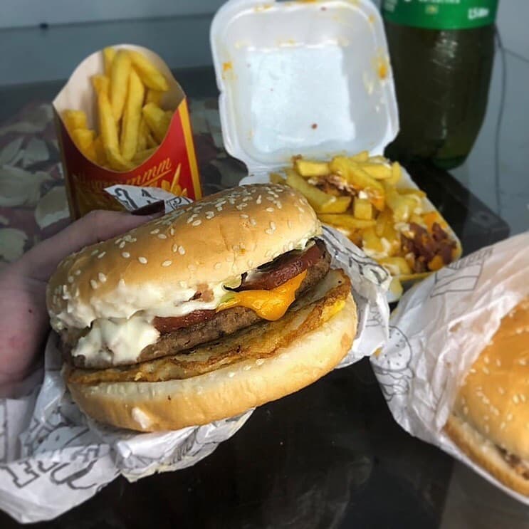 Foto de perfil da Luiza para a seção de avaliações.